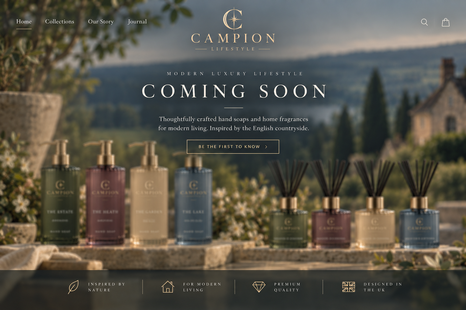 A softly blurred preview of four tall CAMPION hand soaps and four shorter reed diffusers in green, muted purple, cream and blue, set against an English country garden.